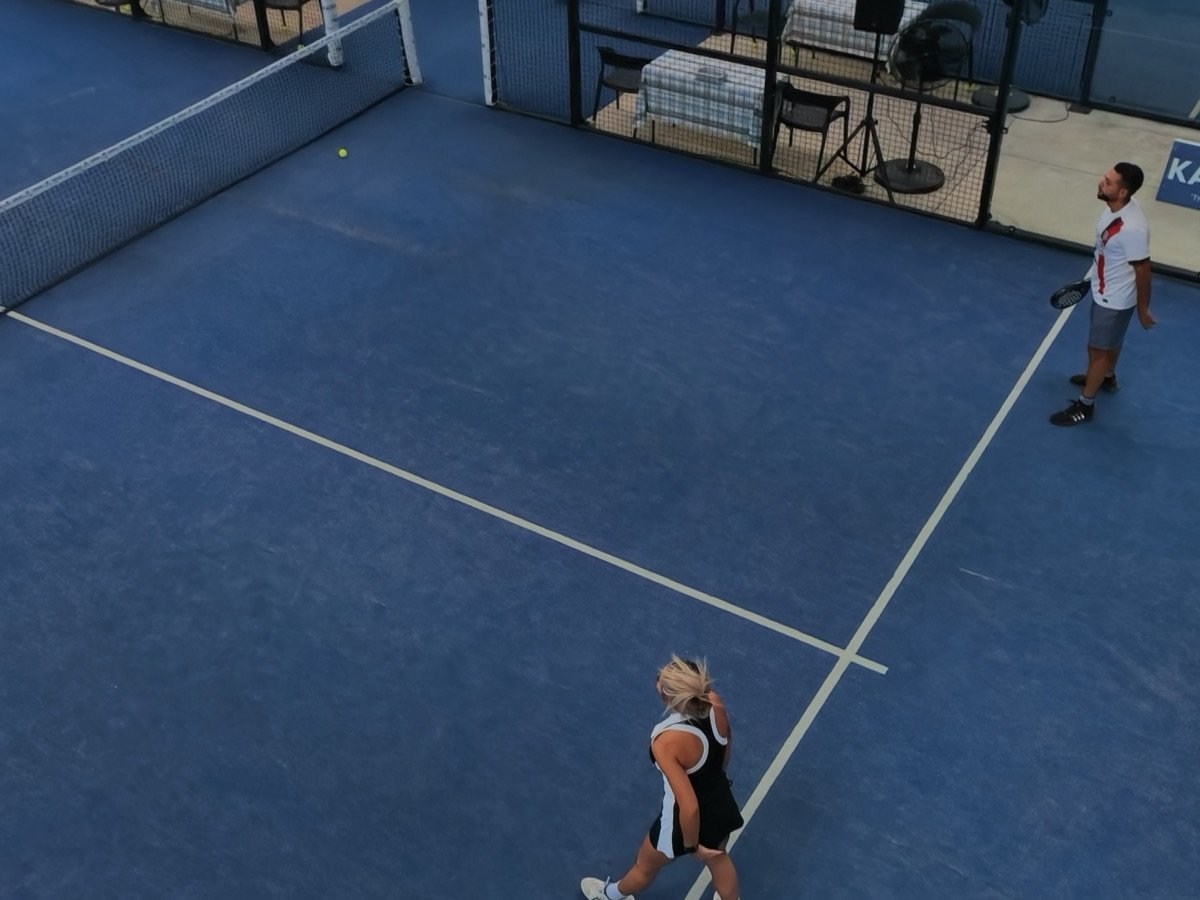 Two players on court, seen from above