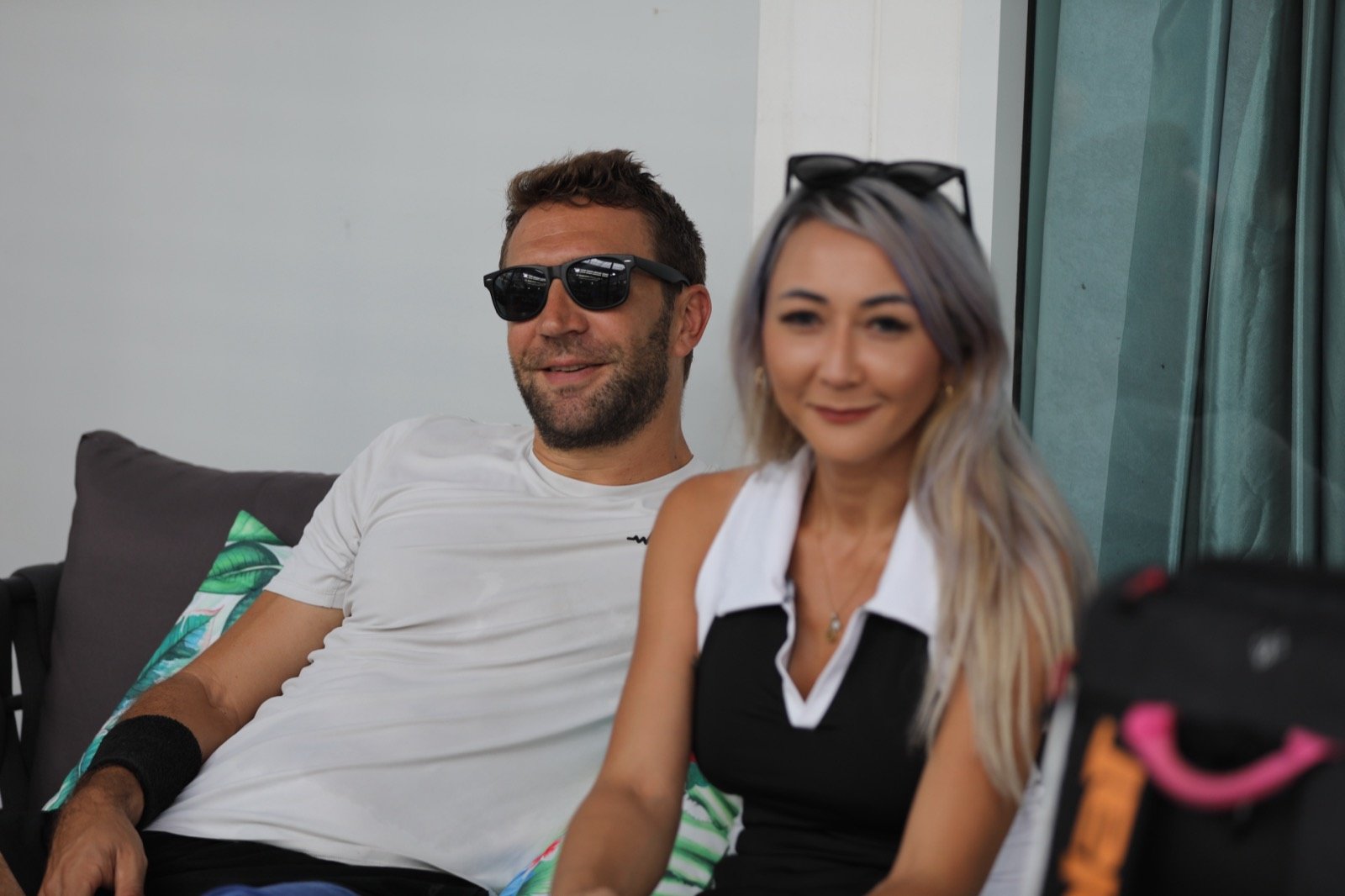 Two players relaxing in the lounge